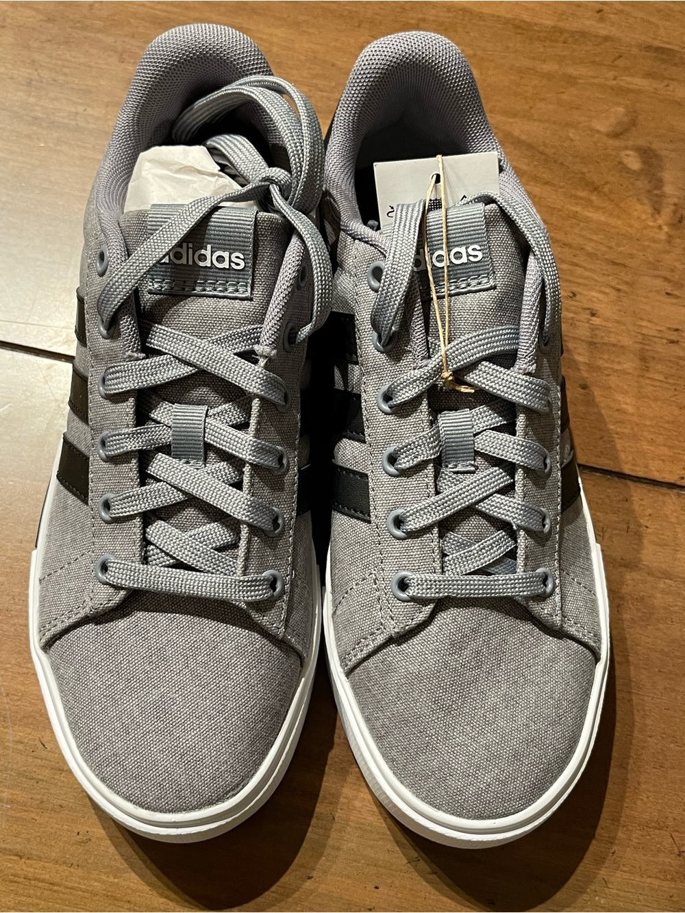 adidas Women’s Gray Canvas Sneakers with Black Stripes